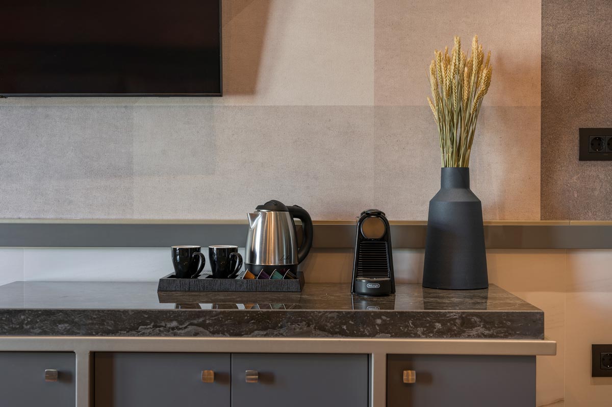 Suites interior, coffee machine on table